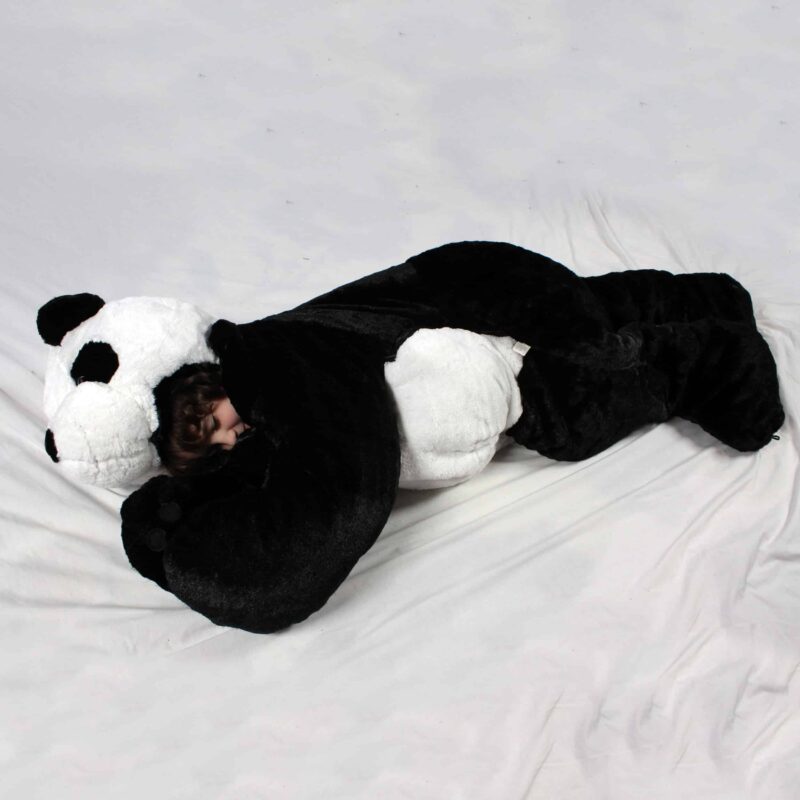 child sleeping in stuffed panda sleeping bag