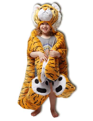 child wearing plush tiger sleeping bag as a blanket