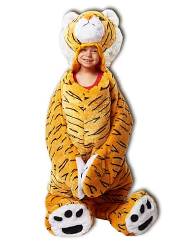 child smiling wearing tiger sleeping bag from snoozzoo