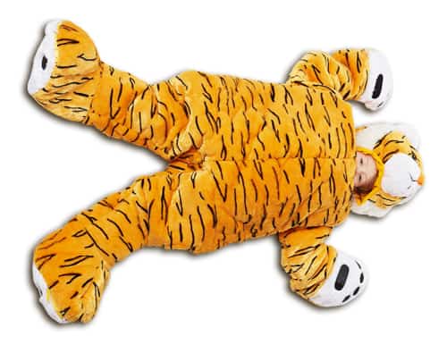 child laying down in plush tiger sleeping bag