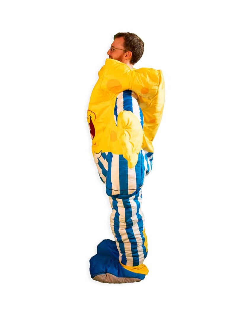 sideview of adult wearing spongebob squarepants sleeping bag